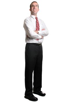 A full body view of a young business man looking forward, isolated against a white background