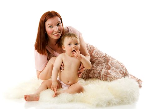 Mother and daughter posing together isolated on white