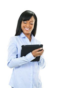 Young smiling black woman using tablet computer