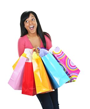 Young happy excited black woman holding shopping bags