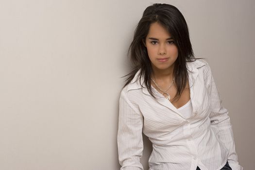 Young woman with white blouse on a white background