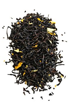 Pile of black tea leaves isolated on white background