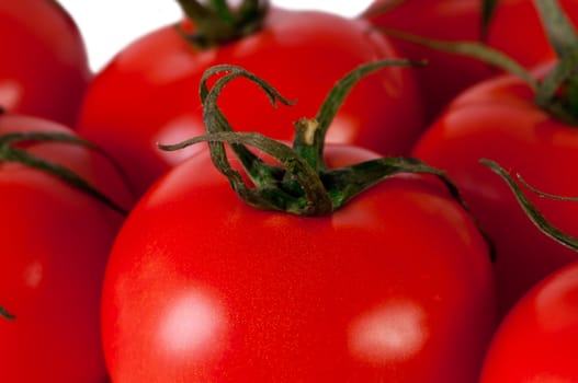 Red tomato isolated on white. Fresh red tomato. Sweet  vegetable.