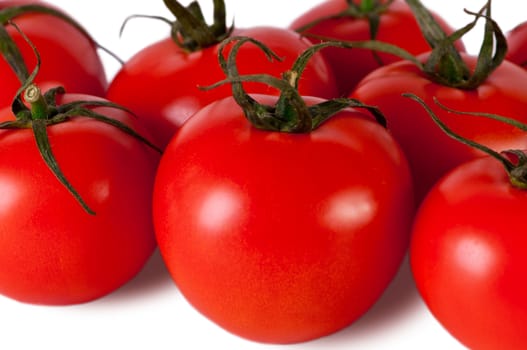 Red tomato isolated on white. Fresh red tomato. Sweet  vegetable.