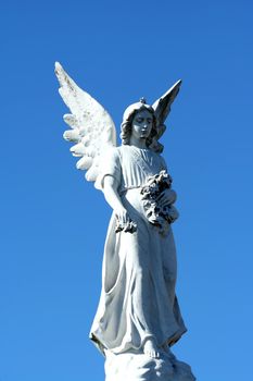 A Angel statue with blue sky
