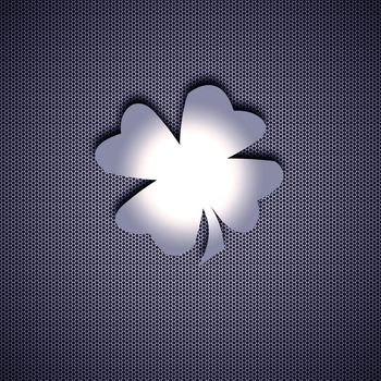 Clover of four leaves isolated on metal background. Steel background.