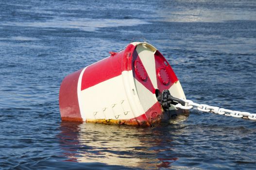 High resolution image. The anchor floats on the river.