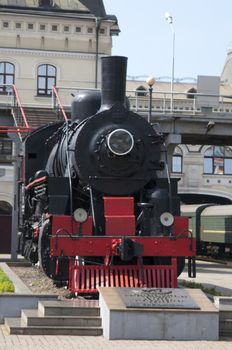 High resolution image. Vintage steam locomotive. Ancient train with a steam locomotive.