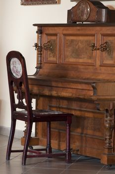 High resolution image. Ancient interior. The piano in a room.