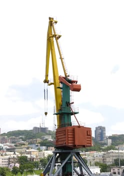 The loading crane in port of a city of Vladivostok.
