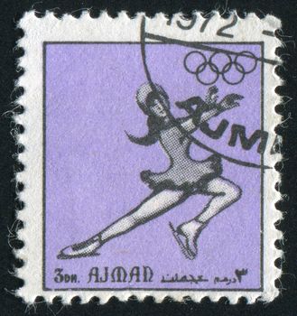 AJMAN - CIRCA 1972: Professional woman figure skater, circa 1972.