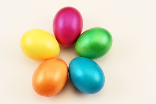 bright pastel colored easter eggs on  background