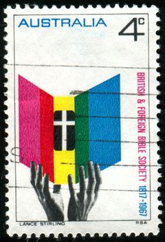 AUSTRALIA - CIRCA 1966: stamp printed by Australia, shows Hands Reaching for Bible, circa 1966