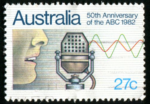 AUSTRALIA - CIRCA 1982: stamp printed by Australia, shows Announcer microphone Emblem, circa 1982