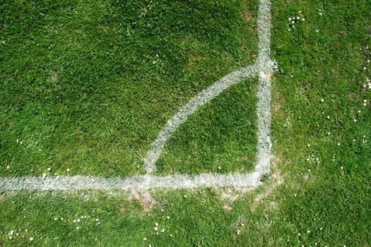 soccer field close-ups of markings on a sunny day