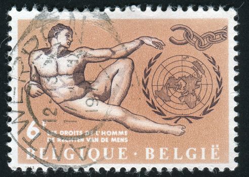 BELGIUM - CIRCA 1962: Adam, by Michelangelo, Broken Chain and UN Emblem, circa 1962.