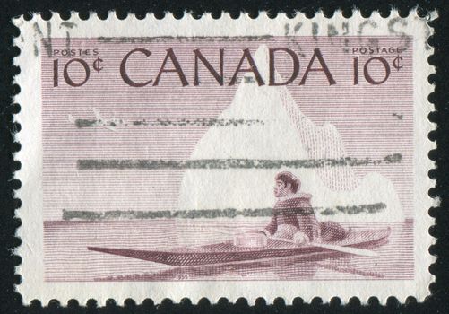 CANADA - CIRCA 1955: stamp printed by Canada, shows Eskimo and Kayak, circa 1955