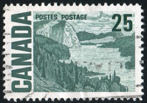 CANADA - CIRCA 1967: stamp printed by Canada, shows �The Solemn Land� by J. E. H. Mac Donald, circa 1967