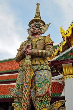 Huge demon standing in front of a buddhist temple, Bangkok, Thailand