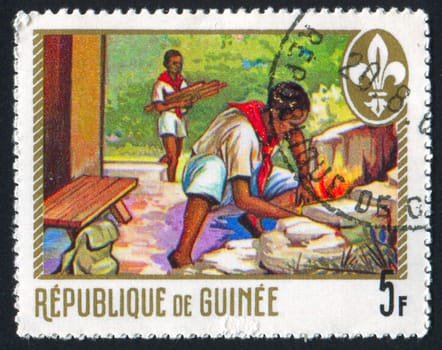 GUINEA - CIRCA 1974: stamp printed by Guinea, shows pioneers, circa 1974