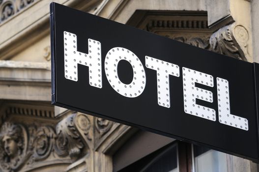 Illuminated urban hotel sign