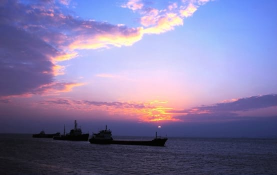 Scenery of ship in the sea at dusk