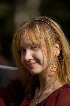 smiling girl with red hair
