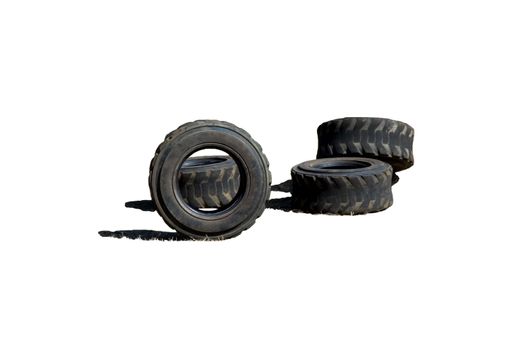 Four worn out tires isolated on white