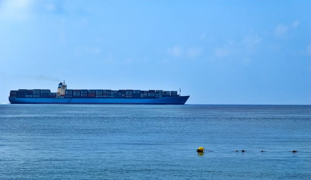 Container ship on the horizon