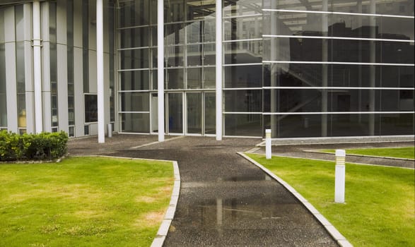 modern building hall entrance from green meadow environment