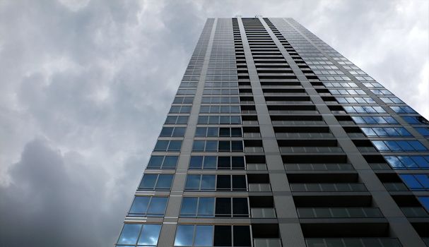 modern up-stair building and dramatic rainy sky background