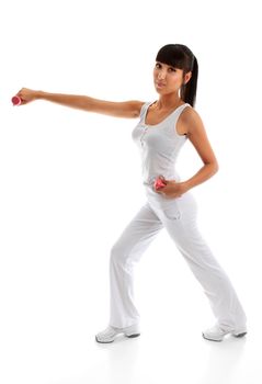 A beautiful young woman in sportswear and using hand weights during exercise workout.