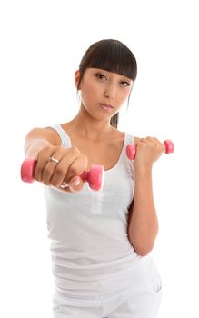 A fit and healthy young woman exercising with hand weights.  White background.  