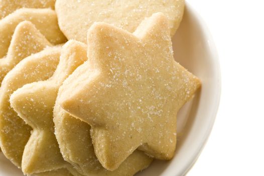 Star shaped homemade cookies in a white plate