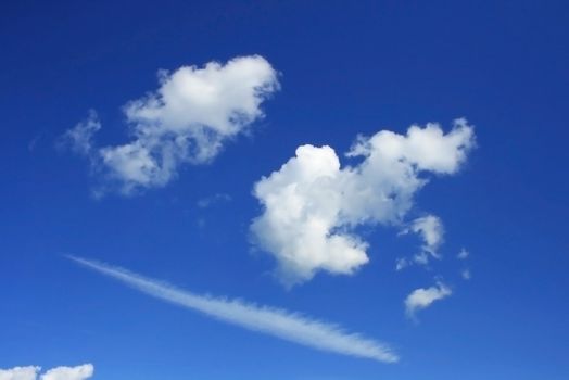 Face made of clouds in the sky.