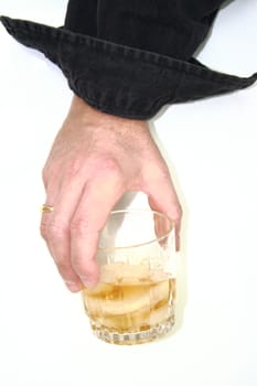 man holding an alcoholic drink in hand