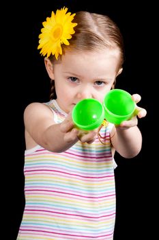 A young girl seems upset because her egg is empty.