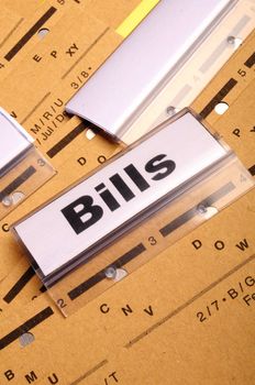 bill or bills word on paper riders showing payment or debts concept