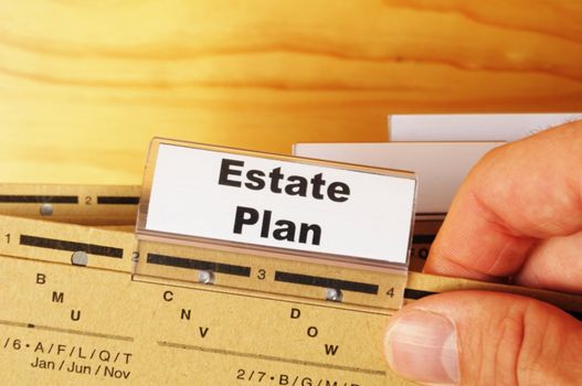 real estate plan on business folder showing buy a house concept