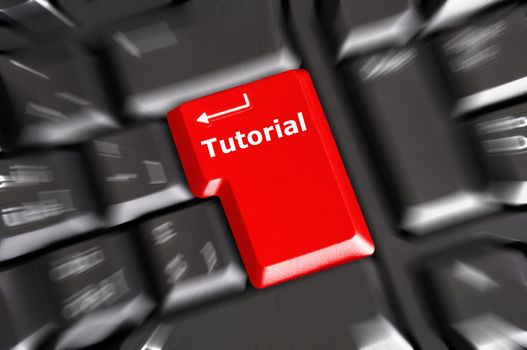 tutorial or e learning concept with key on computer keyboard