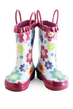 Pair of little girl's fun rain boots galoshes with water droplets on them
