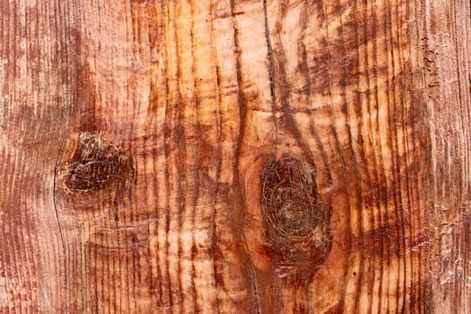 The wide wooden board is grounded varnish