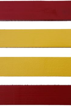 Four parallel wooden boards painted in red and yellow on a white background