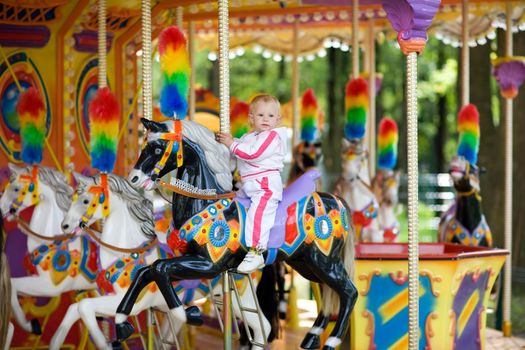 child in park of attractions