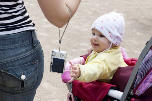 child extending to the camera