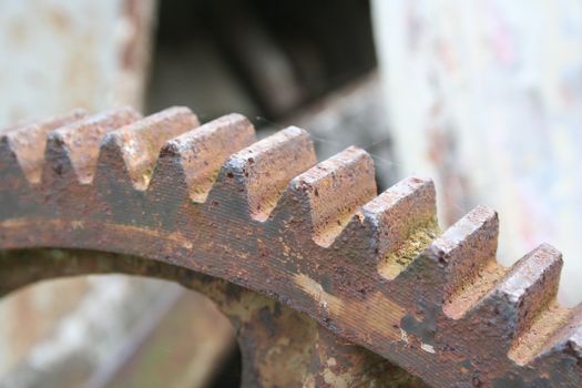 Old rusty cogwheel - industrial background