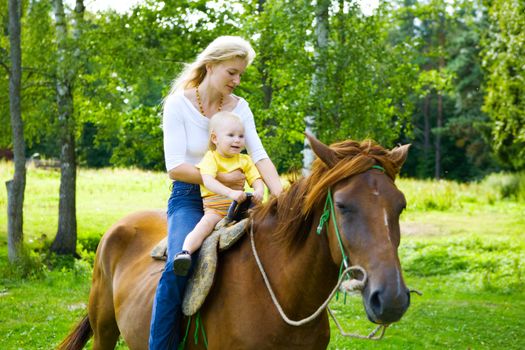 mom and child on the horse