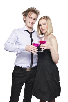 Young couple toasting with pink drink. Two people drinking. Studio photo, isolated.