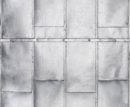 Metal panels on industrial door or wall seamlessly tileable