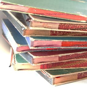 Stack of old style files made of thick and soft paper with hard cover.